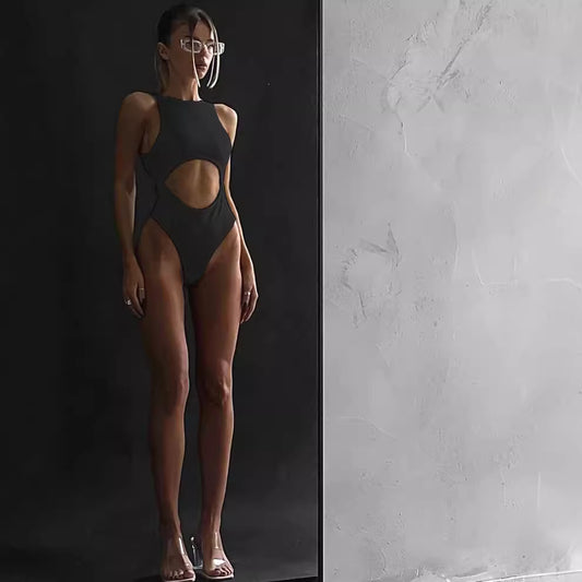 Eprolo sleeveless hollow-out jumpsuit with navel-revealing design, showcasing a sexy, fitted style for hot girl fashion.