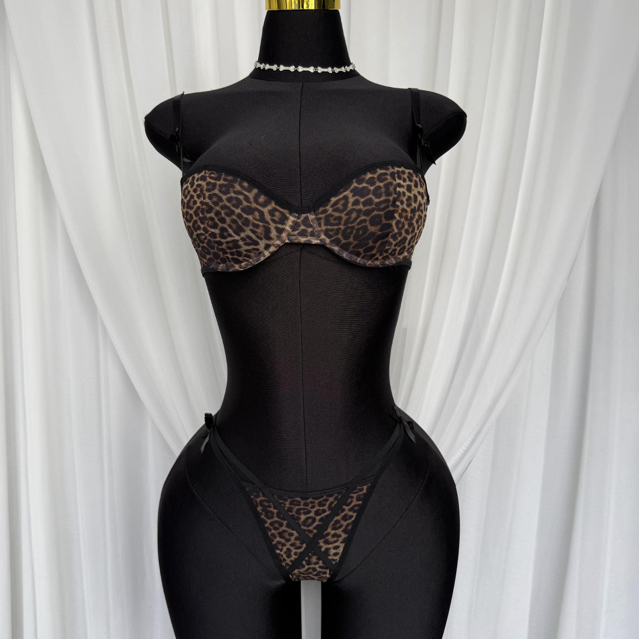 Leopard print erotic lingerie set from eprolo featuring a French bra and ultra-thin mesh underwear with revealing design.