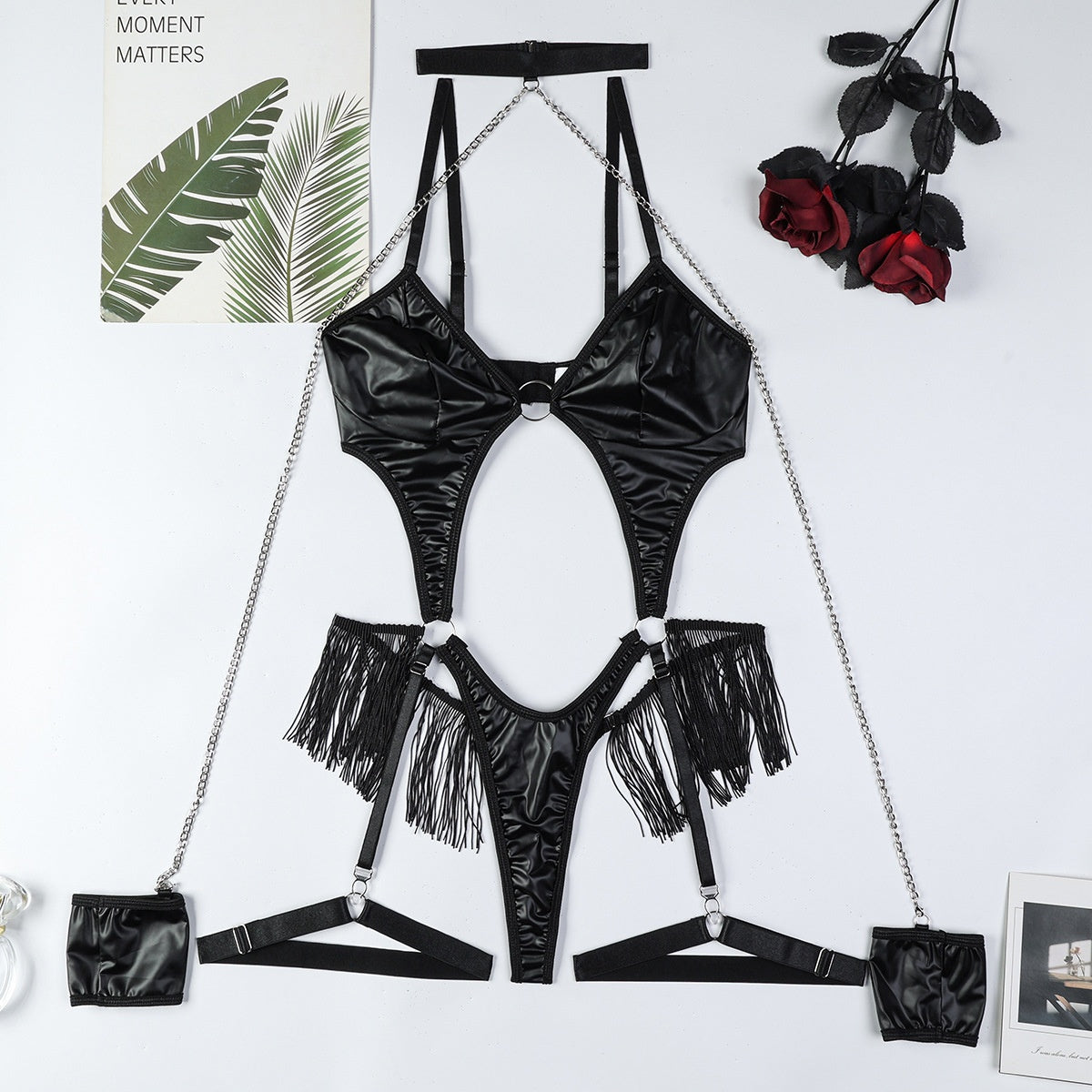 Black PU Leather Metallic Chain Neckline Hip Tassel Decorated Hollow Out Sexy  Jumpsuit eprolo