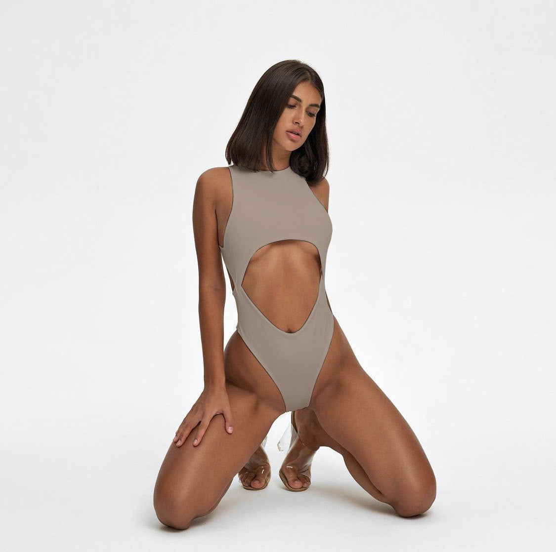 Eprolo sleeveless jumpsuit with sexy hollow-out design and navel-revealing cut, form-fitting and stylish for a hot, bold look.